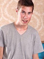 Tall twink Matt Johnson busts a nut all over his chest.